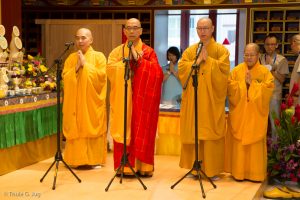 Mahayana monks chanting prayers