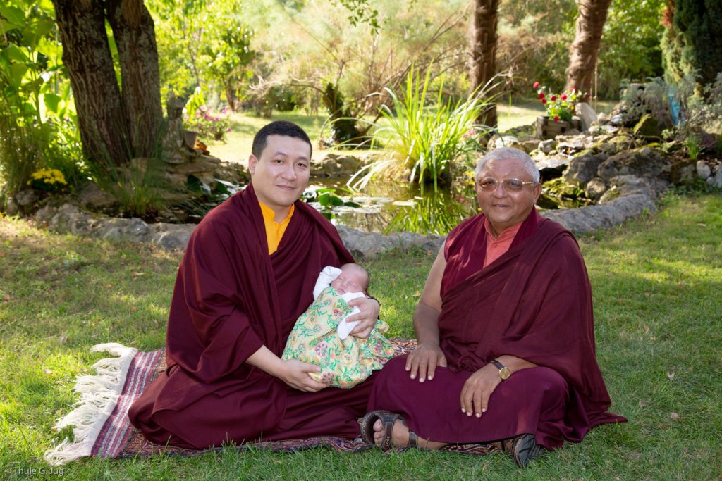 Thaye Dorje, His Holiness the 17th Gyalwa Karmapa, rests with Jigme Rinpoche, Karmapa's General Secretary, while Thugsey also takes a rest