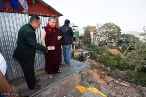 Mr Roshan and others showed Karmapa the building site and shared the progress of the work.